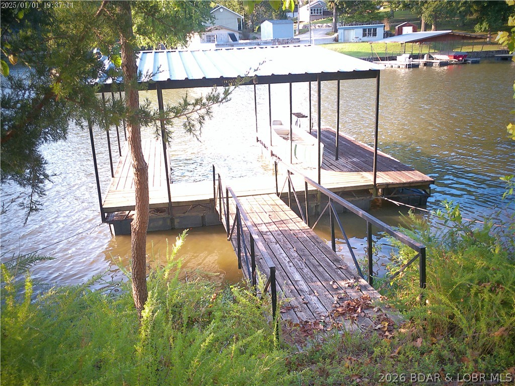 1814 Sagrada Road Edwards, MO 65326 - Photo 3 of 62 Included is Single-Slip BOAT DOCK on Lake Front- B