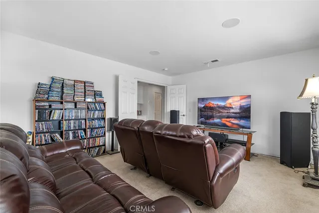 a shelf with books and knick knacks on it