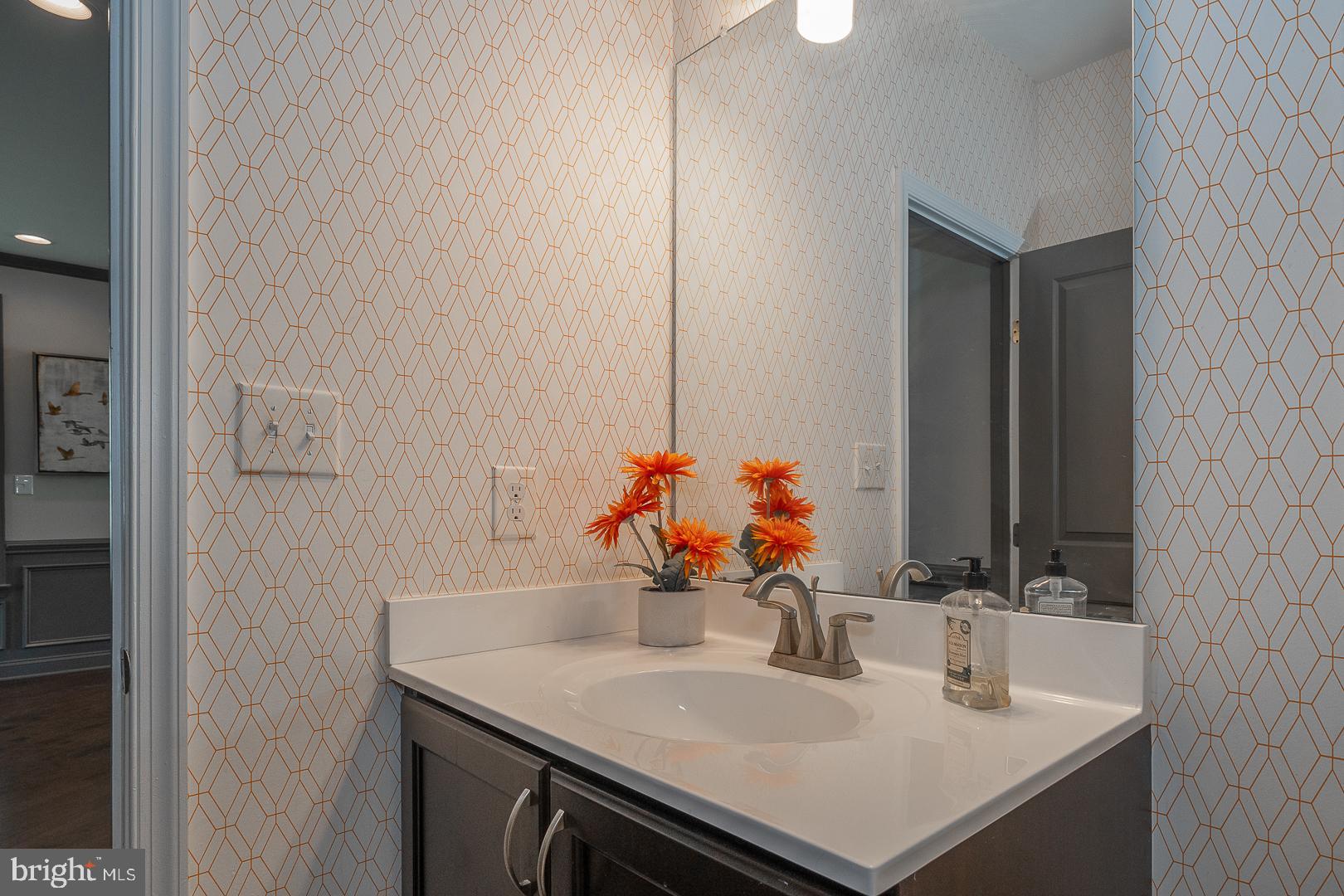 131 Spring Oak Drive Malvern, PA 19355 - Photo 12 of 93 a bathroom with a sink and a mirror