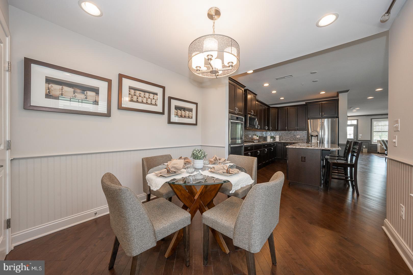 131 Spring Oak Drive Malvern, PA 19355 - Photo 22 of 93 a view of a dining room with furniture and wooden floor