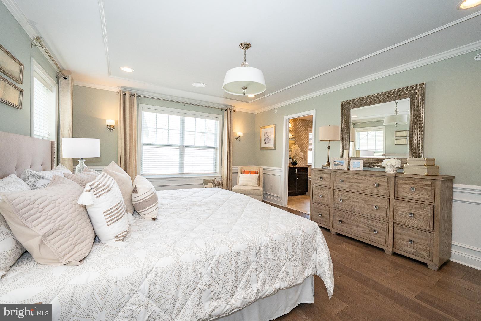 131 Spring Oak Drive Malvern, PA 19355 - Photo 27 of 93 a spacious bedroom with a large bed and a dresser
