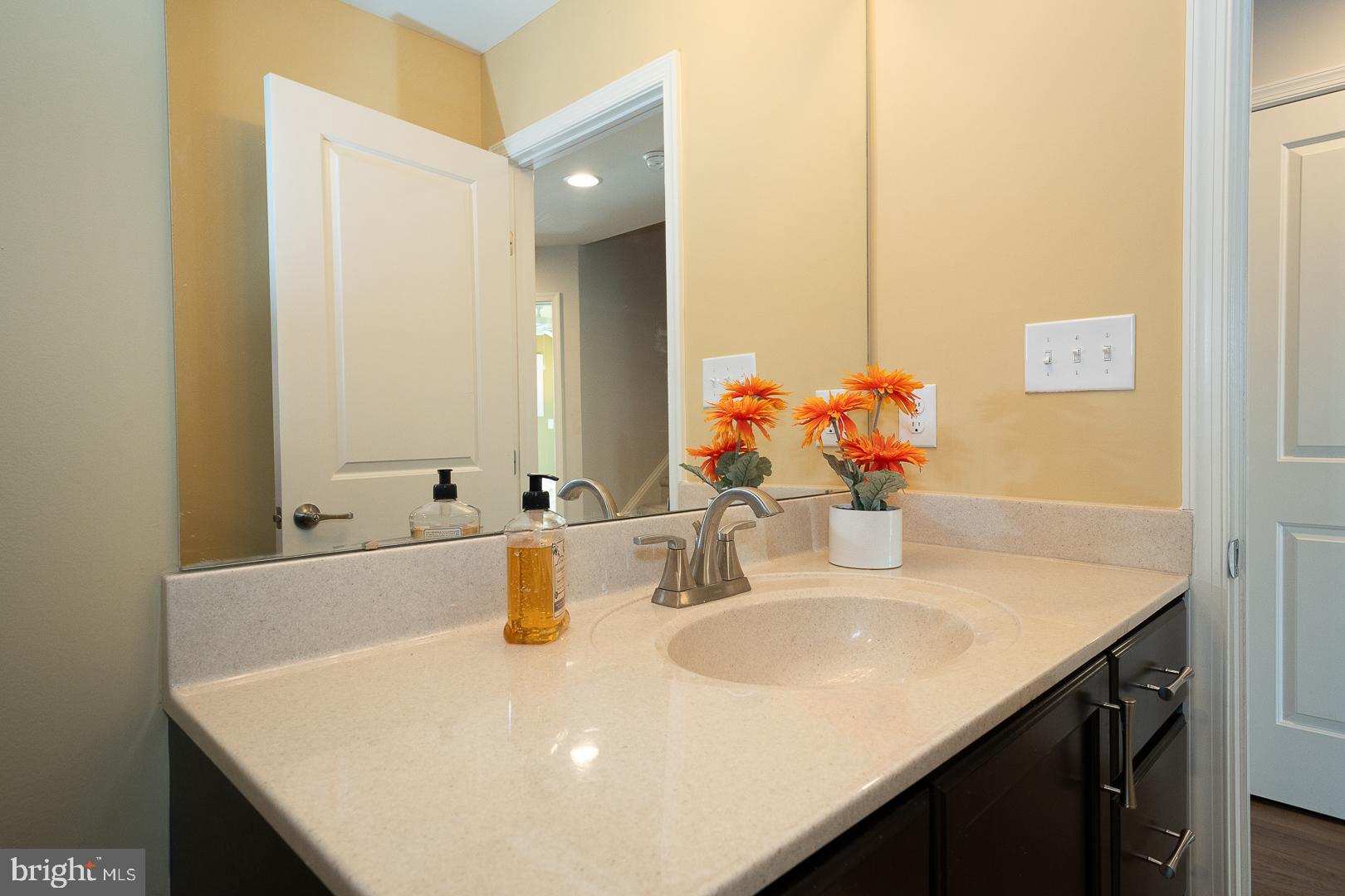 131 Spring Oak Drive Malvern, PA 19355 - Photo 43 of 93 a bathroom with a sink and a mirror