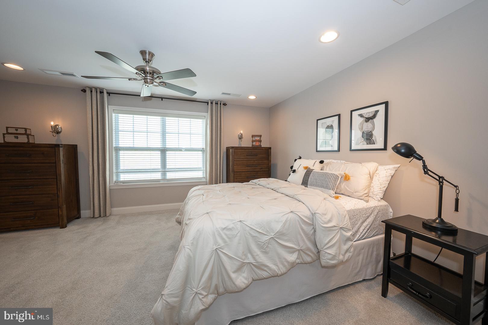 131 Spring Oak Drive Malvern, PA 19355 - Photo 49 of 93 a spacious bedroom with a bed and a window