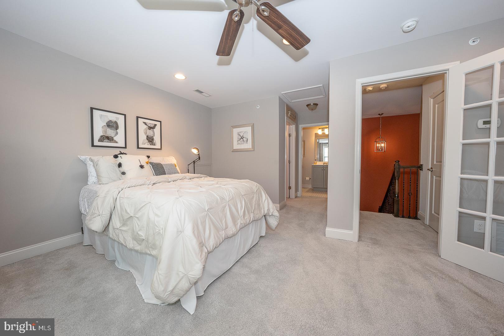 131 Spring Oak Drive Malvern, PA 19355 - Photo 52 of 93 a spacious bedroom with a bed and a walk in closet