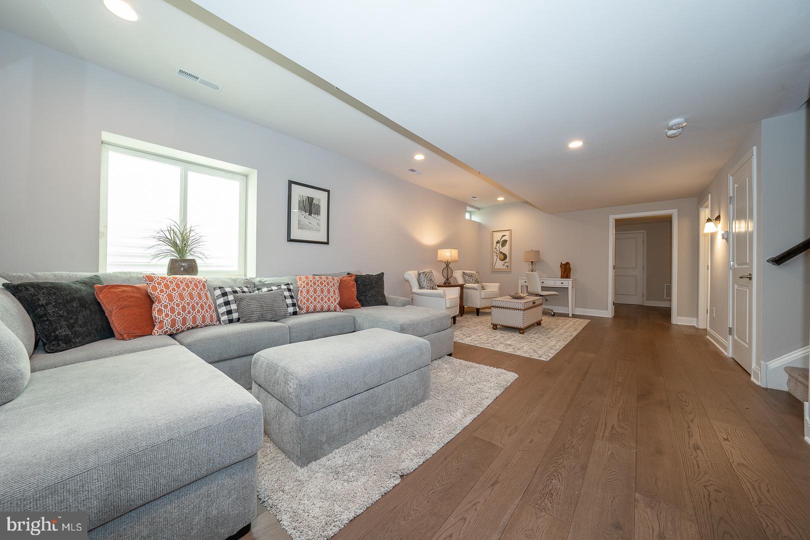 131 Spring Oak Drive Malvern, PA 19355 - Photo 57 of 93 a living room with furniture and a wooden floor