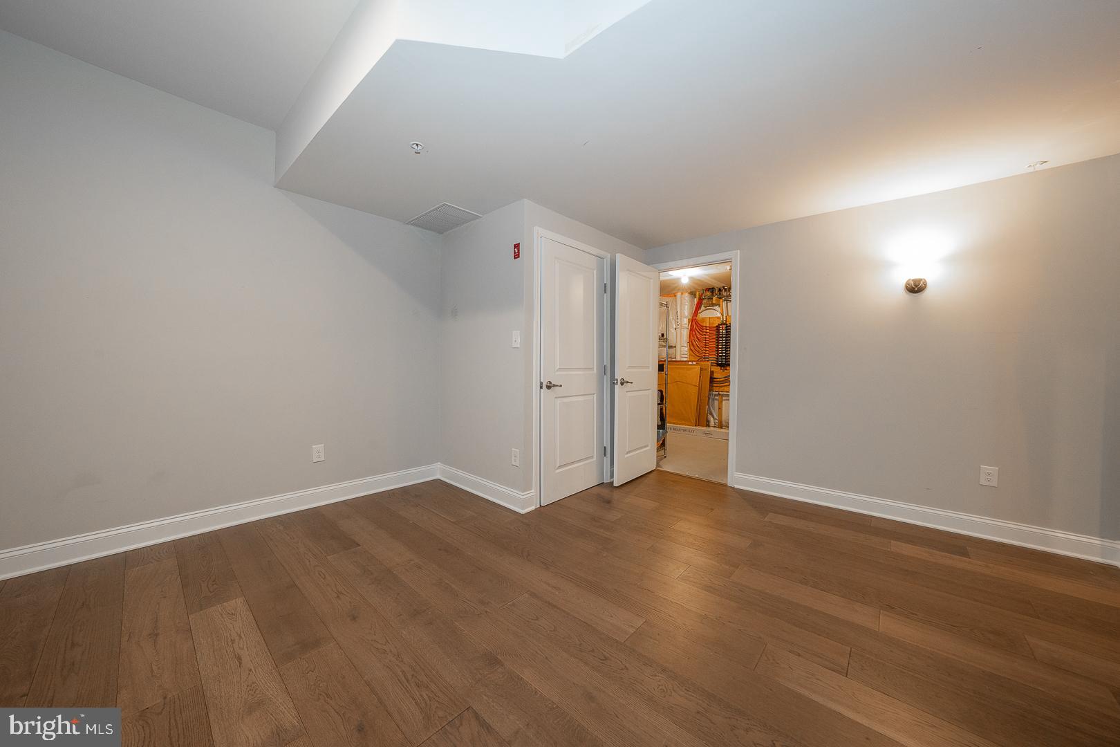 131 Spring Oak Drive Malvern, PA 19355 - Photo 69 of 93 an empty room with wooden floor and windows