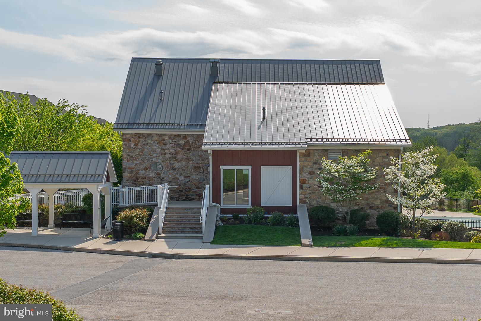 131 Spring Oak Drive Malvern, PA 19355 - Photo 77 of 93 a front view of a house with garden