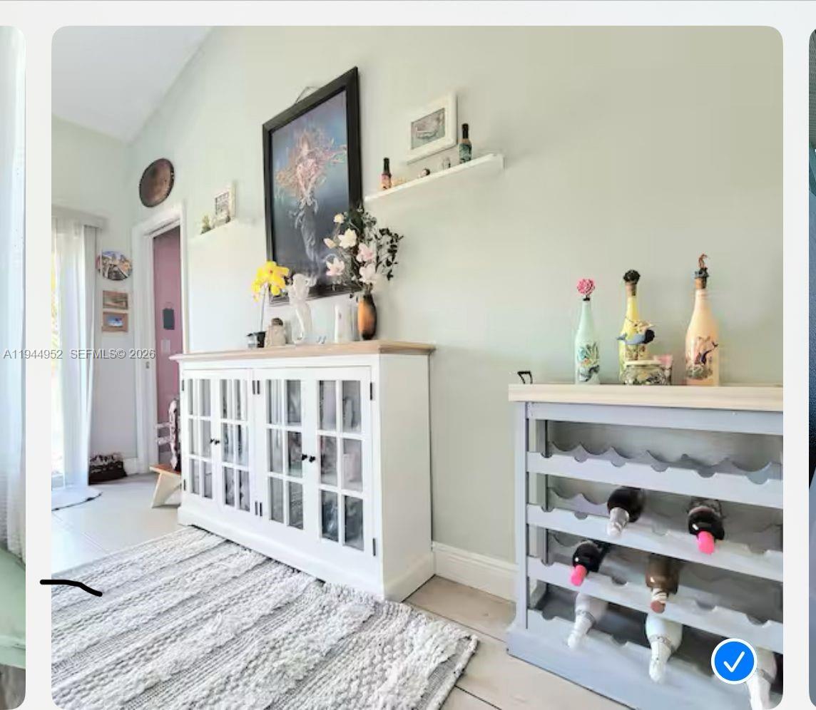 562 Flamingo Road Venice, FL 34293 - Photo 6 of 15 a bedroom with furniture and a wooden floor
