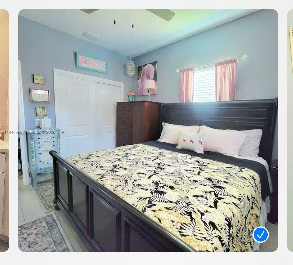 562 Flamingo Road Venice, FL 34293 - Photo 7 of 15 a bedroom with a bed and a dresser