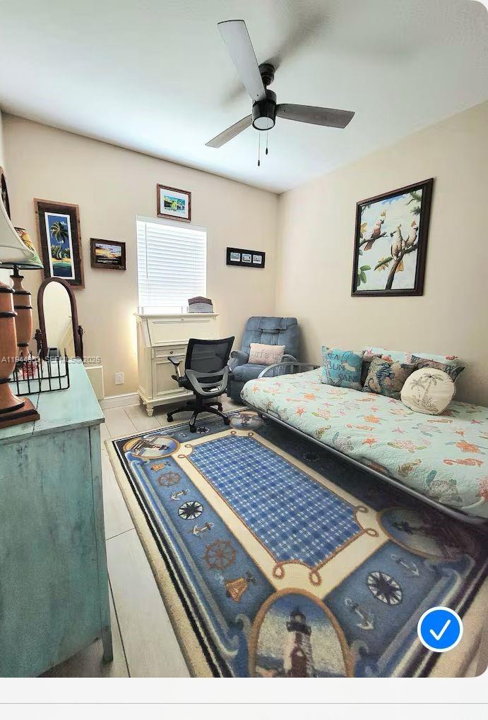 562 Flamingo Road Venice, FL 34293 - Photo 8 of 15 a living room with couch and a couch