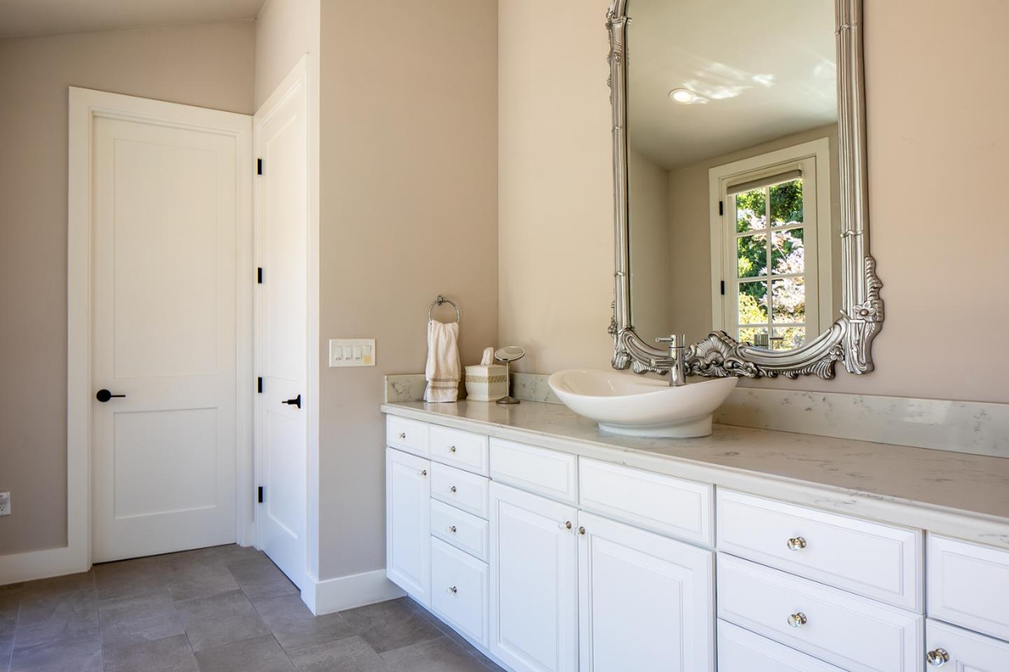 5445 Quail Way Carmel, CA 93923 - Photo 13 of 28 a bathroom with a sink and a mirror