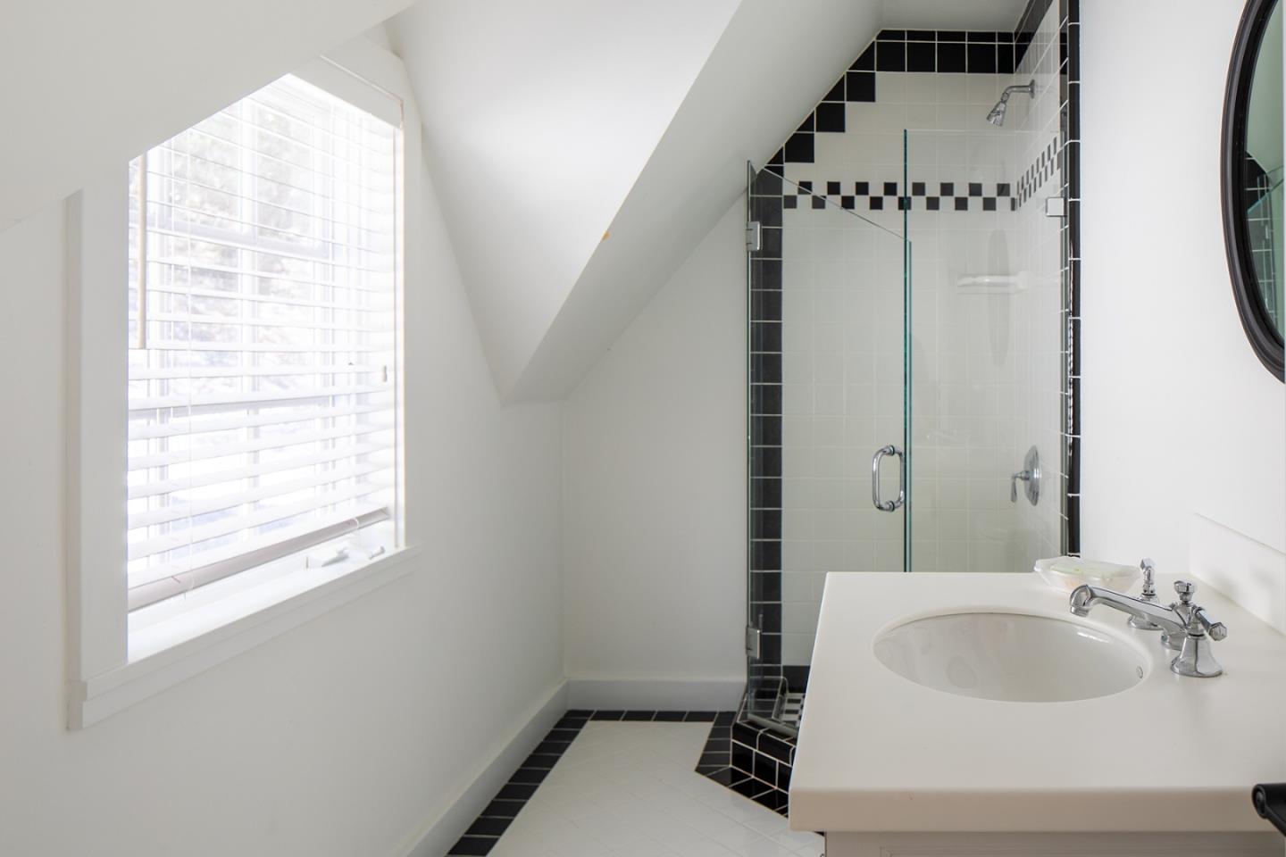 5445 Quail Way Carmel, CA 93923 - Photo 24 of 28 a bathroom with a sink and a mirror
