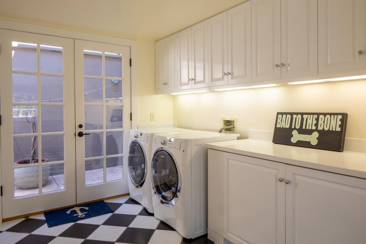5445 Quail Way Carmel, CA 93923 - Photo 26 of 28 a utility room with dryer and washer
