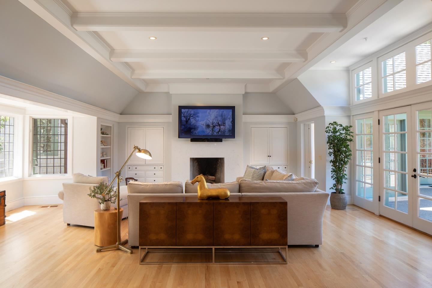 5445 Quail Way Carmel, CA 93923 - Photo 5 of 28 a living room with fireplace furniture and a wooden floor