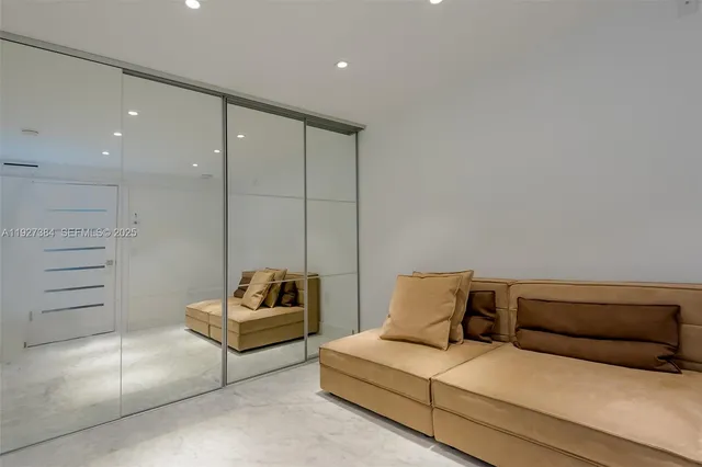 a bedroom with a bed and furniture