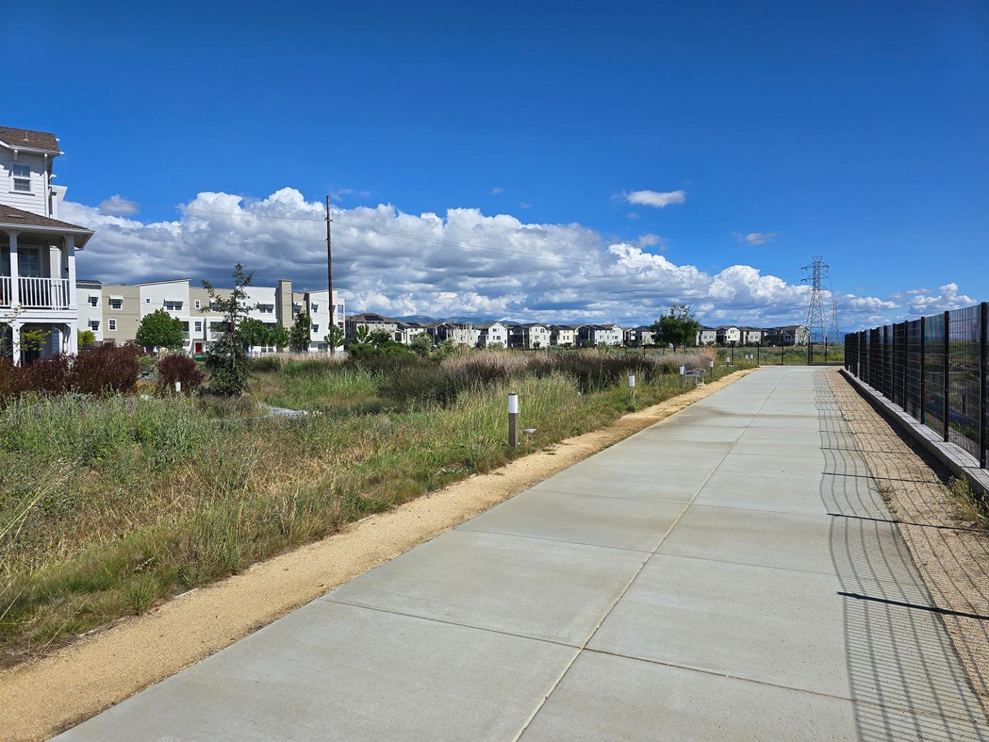 9532 Seawind Way Newark, CA 94560 - Photo 42 of 44 a view of a lake with a yard