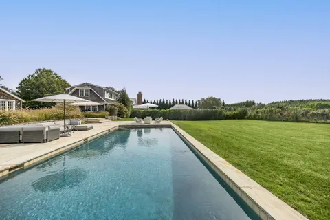 a view of swimming pool from a balcony