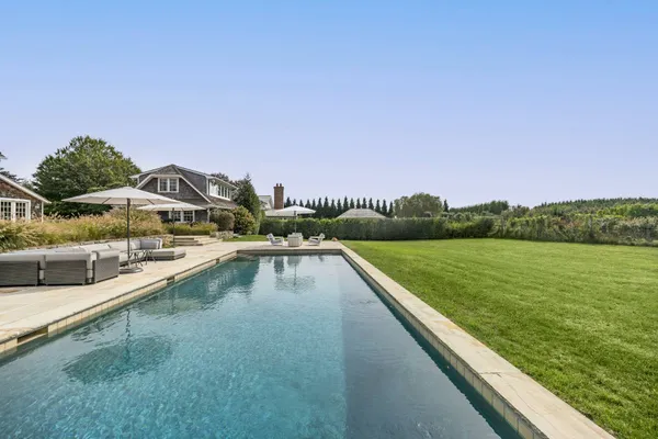 a view of swimming pool from a balcony