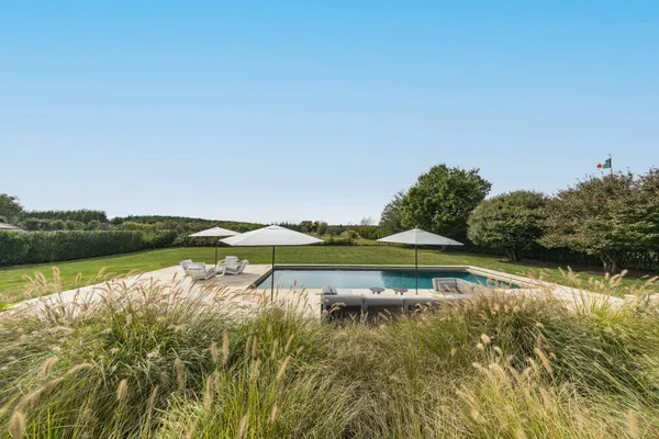 a view of a lake with houses in ocean