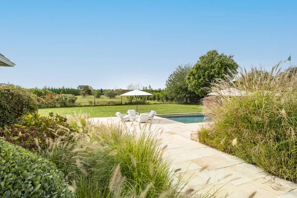 a view of a lake with a yard