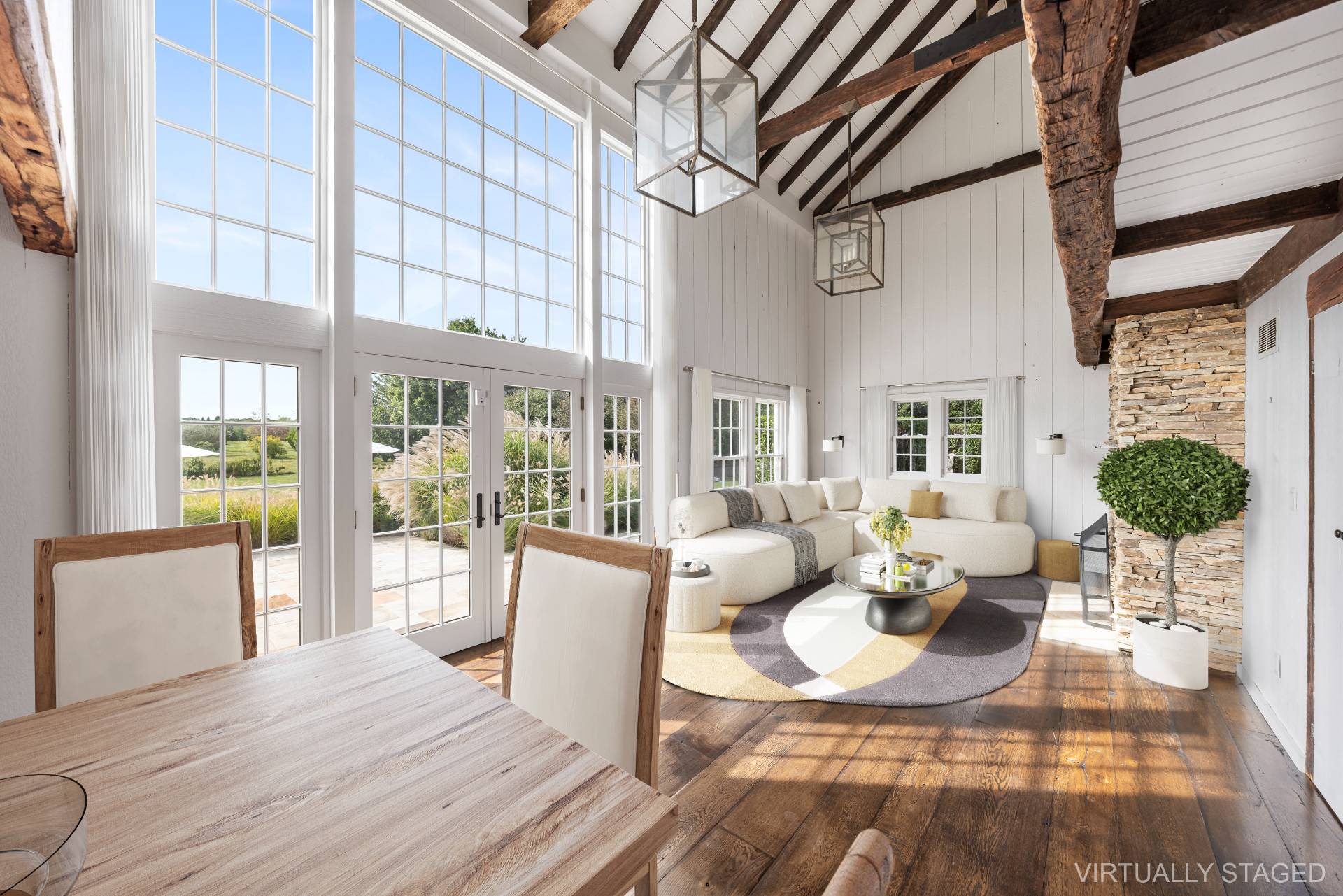 940 Deerfield Road Water Mill, NY 11976 - Photo 2 of 22 a living room with furniture and a large window