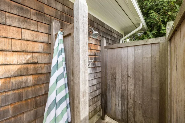 a view of a wooden door and outdoor space