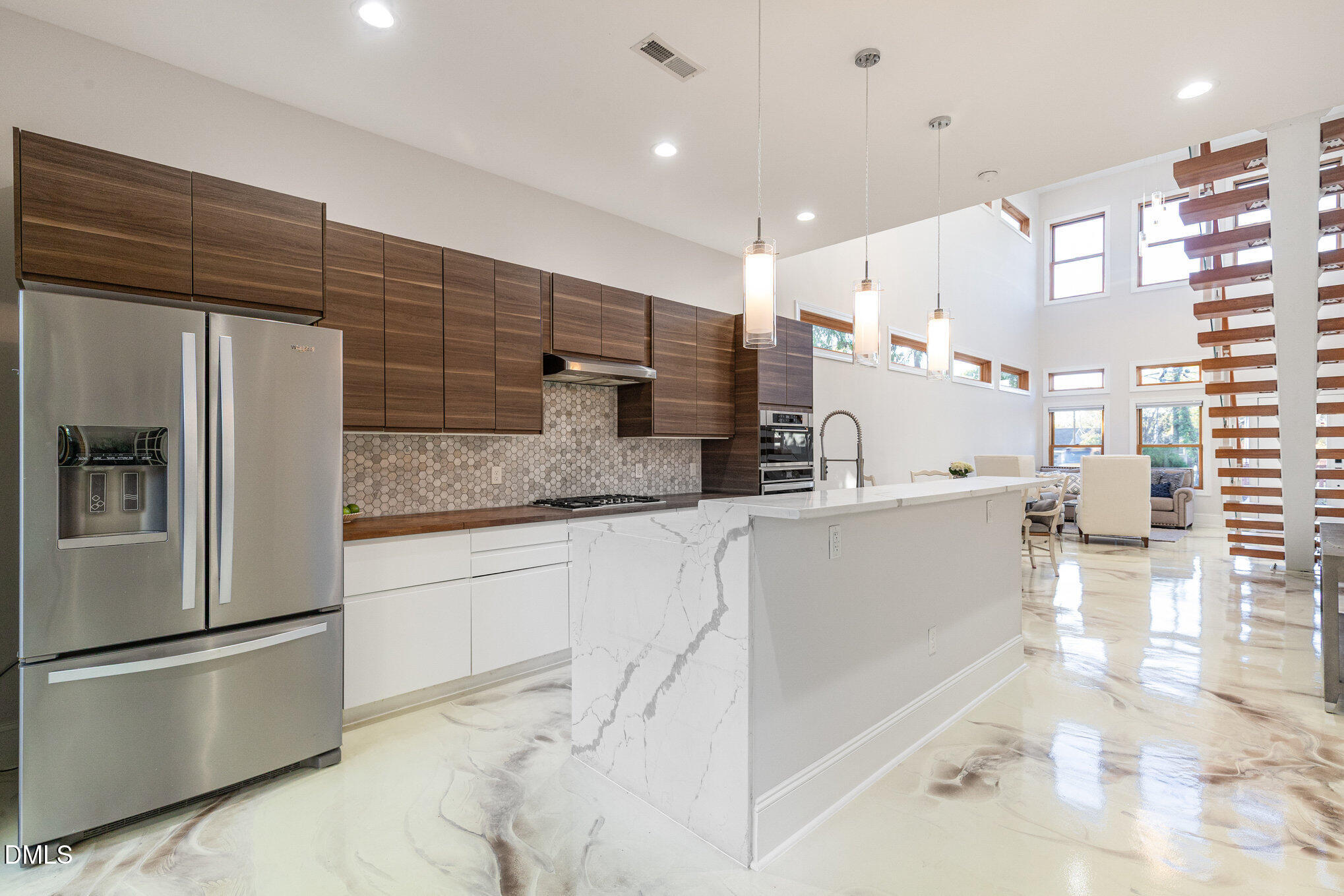 809 Drew Street Durham, NC 27701 - Photo 10 of 38 a kitchen with stainless steel appliances granite countertop a refrigerator and a sink
