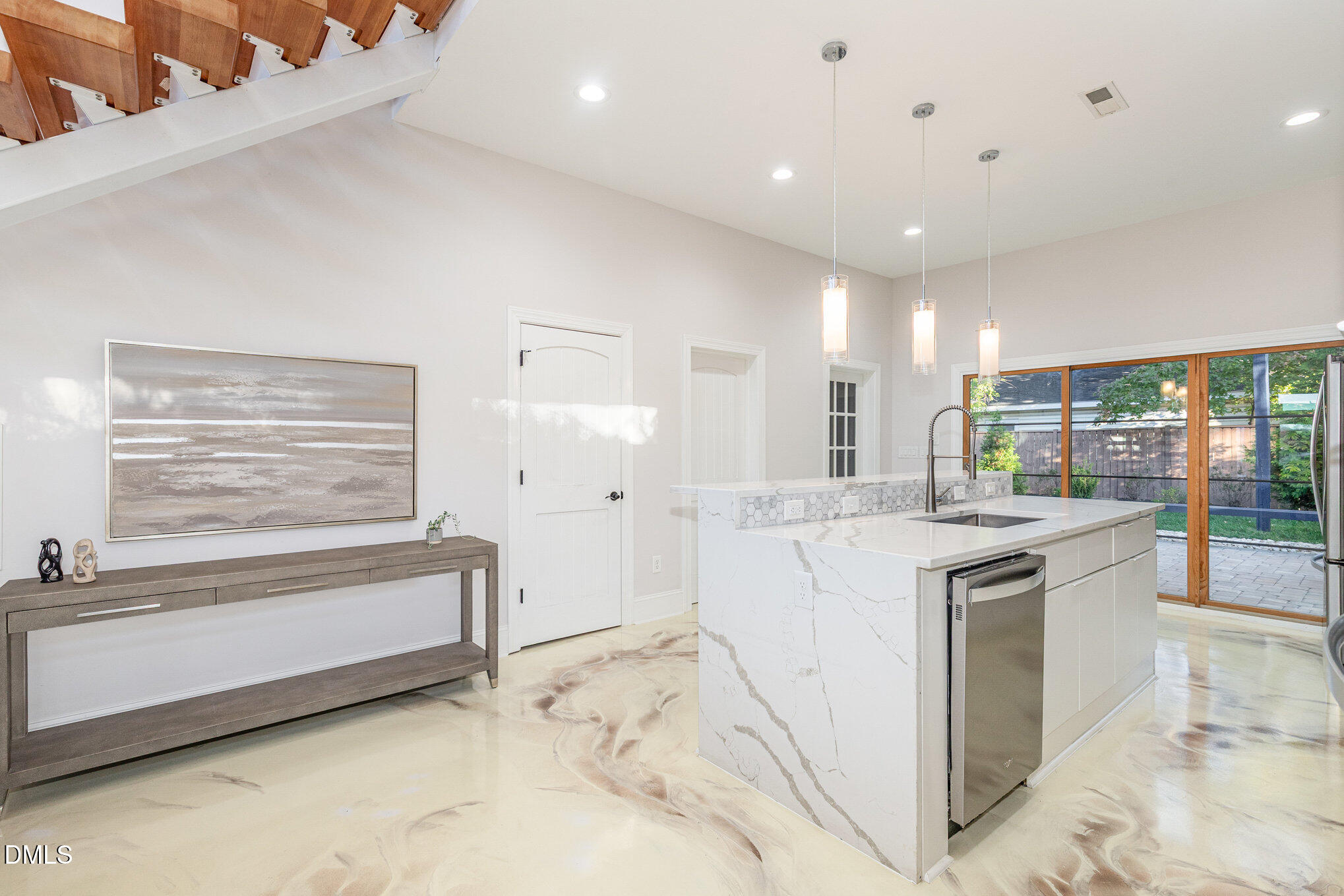 809 Drew Street Durham, NC 27701 - Photo 11 of 38 a kitchen with stainless steel appliances granite countertop a sink and cabinets