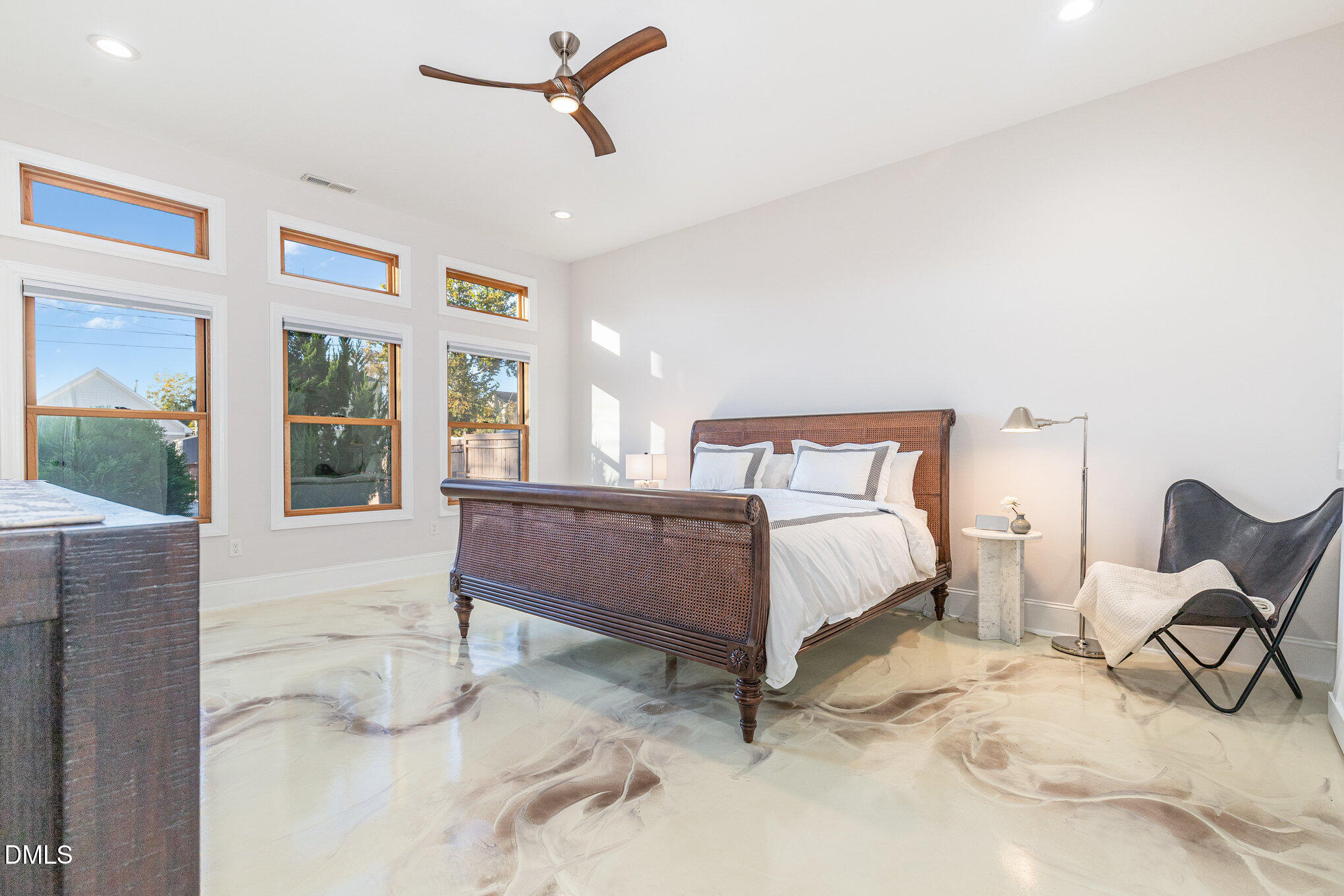 809 Drew Street Durham, NC 27701 - Photo 17 of 38 a bedroom with a bed a table and chair