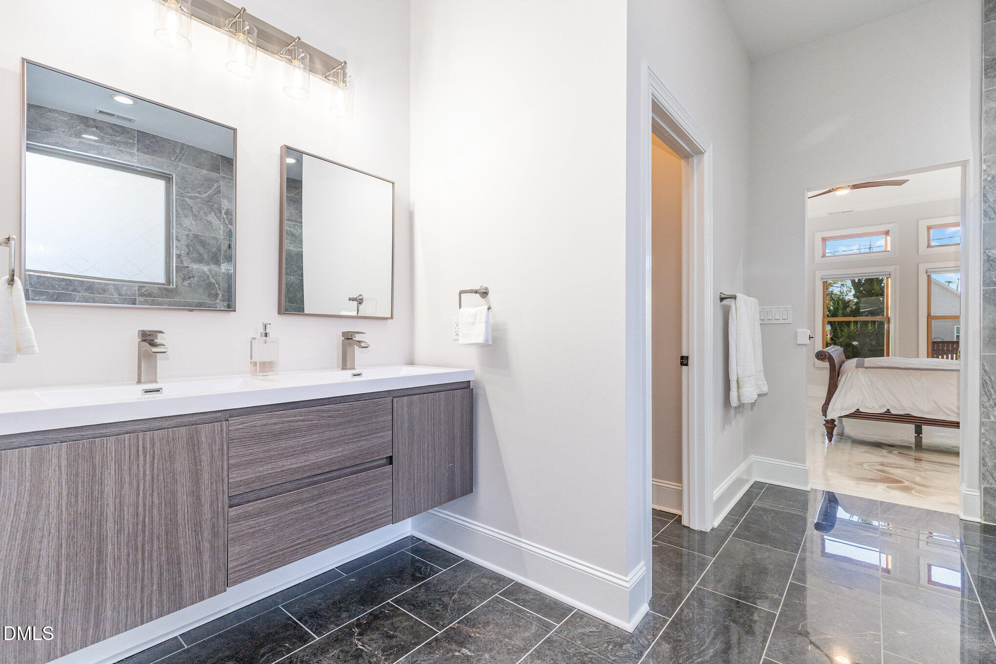 809 Drew Street Durham, NC 27701 - Photo 20 of 38 a bathroom with a sink and a mirror