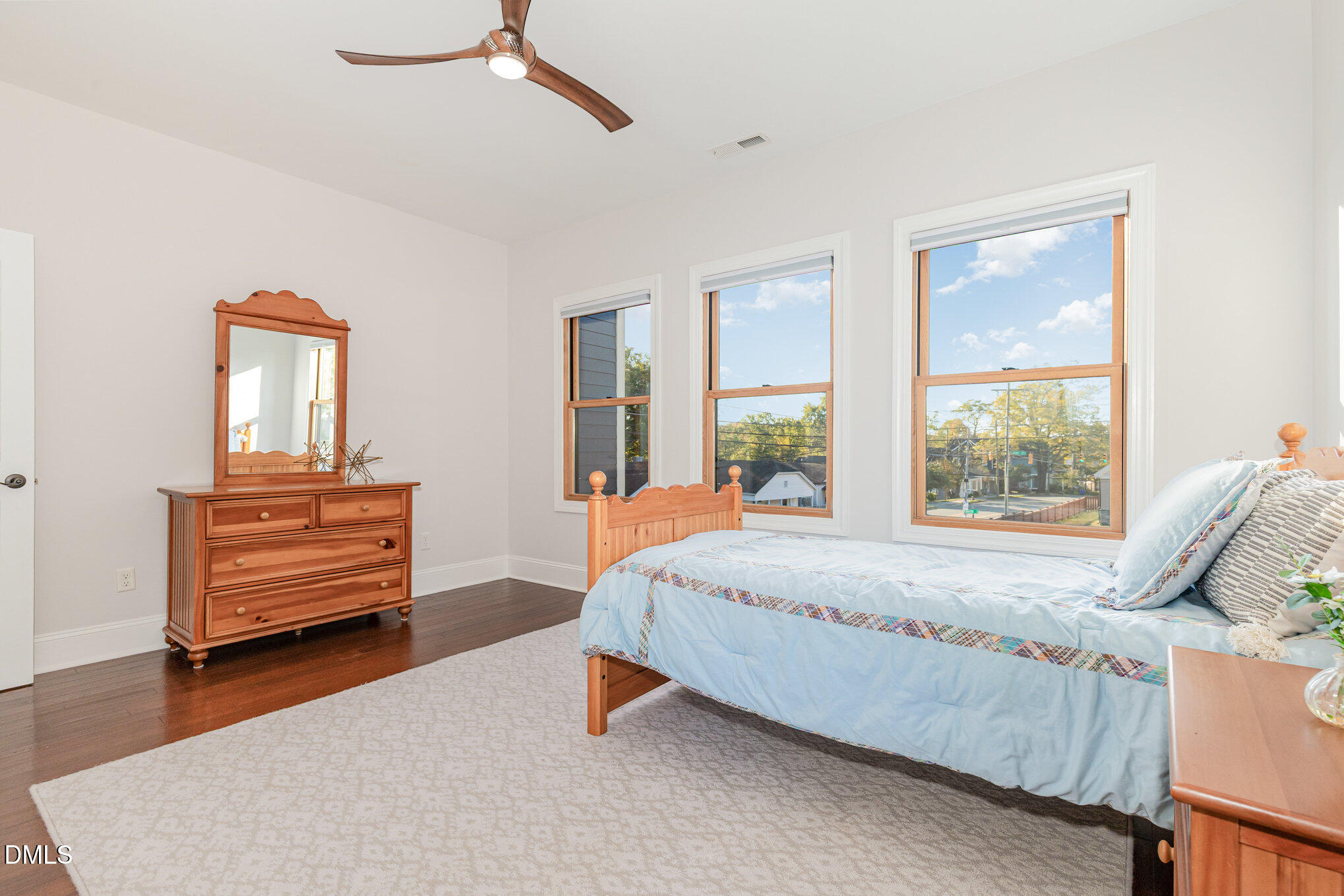 809 Drew Street Durham, NC 27701 - Photo 26 of 38 a bedroom with a bed and a dresser