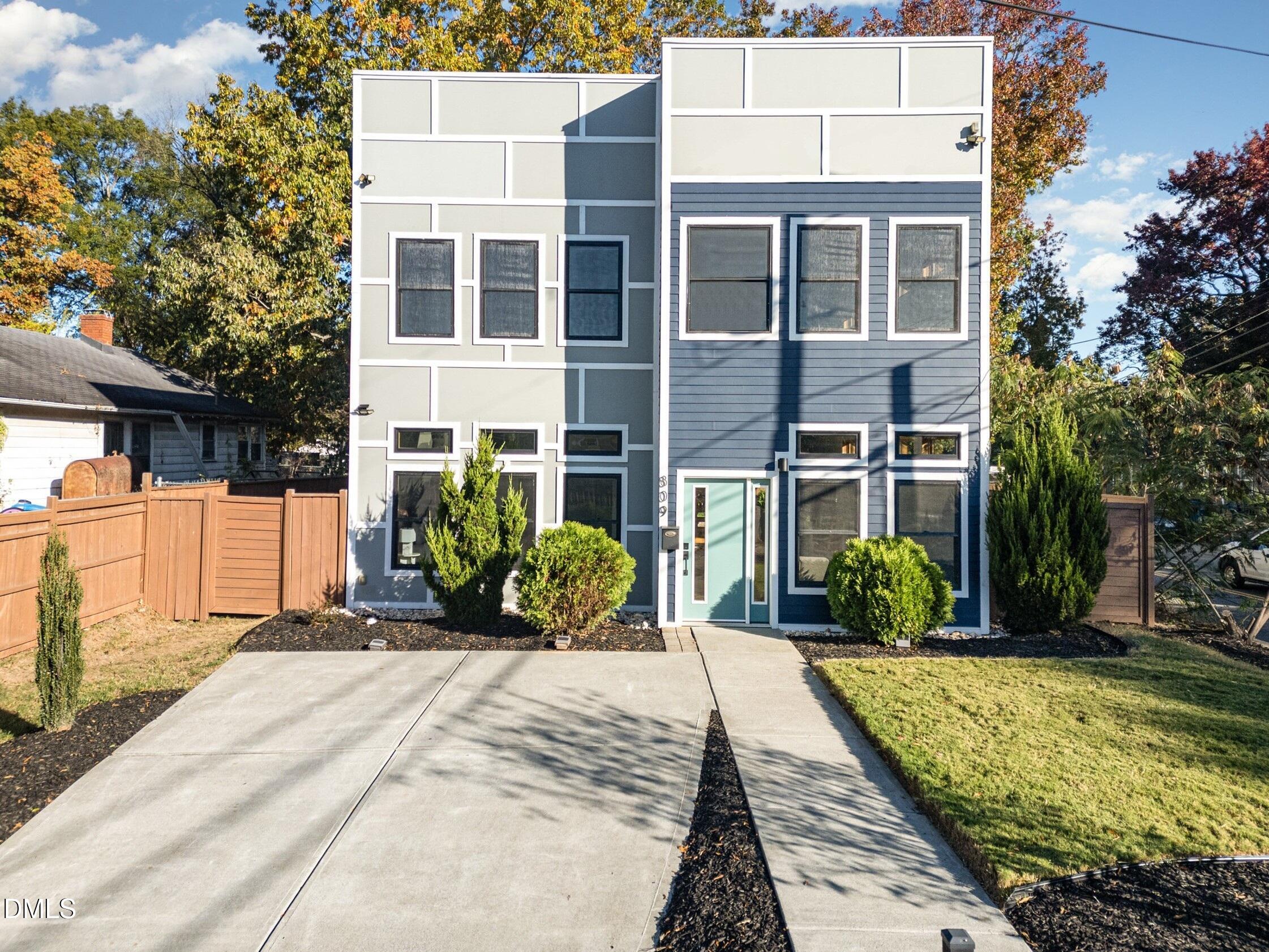 809 Drew Street Durham, NC 27701 - Photo 2 of 38 a front view of a house with a yard
