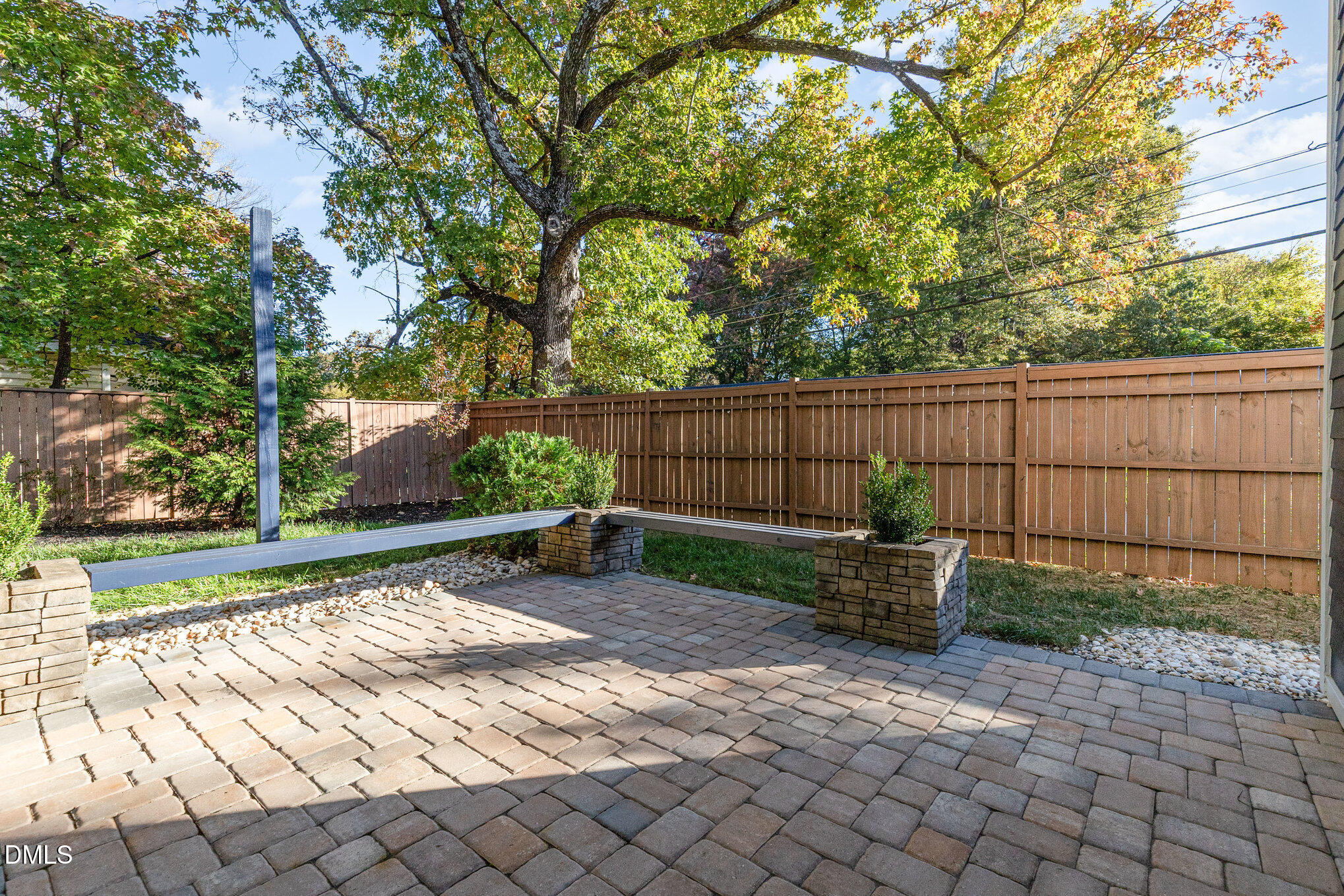 809 Drew Street Durham, NC 27701 - Photo 29 of 38 a view of a backyard with wooden fence