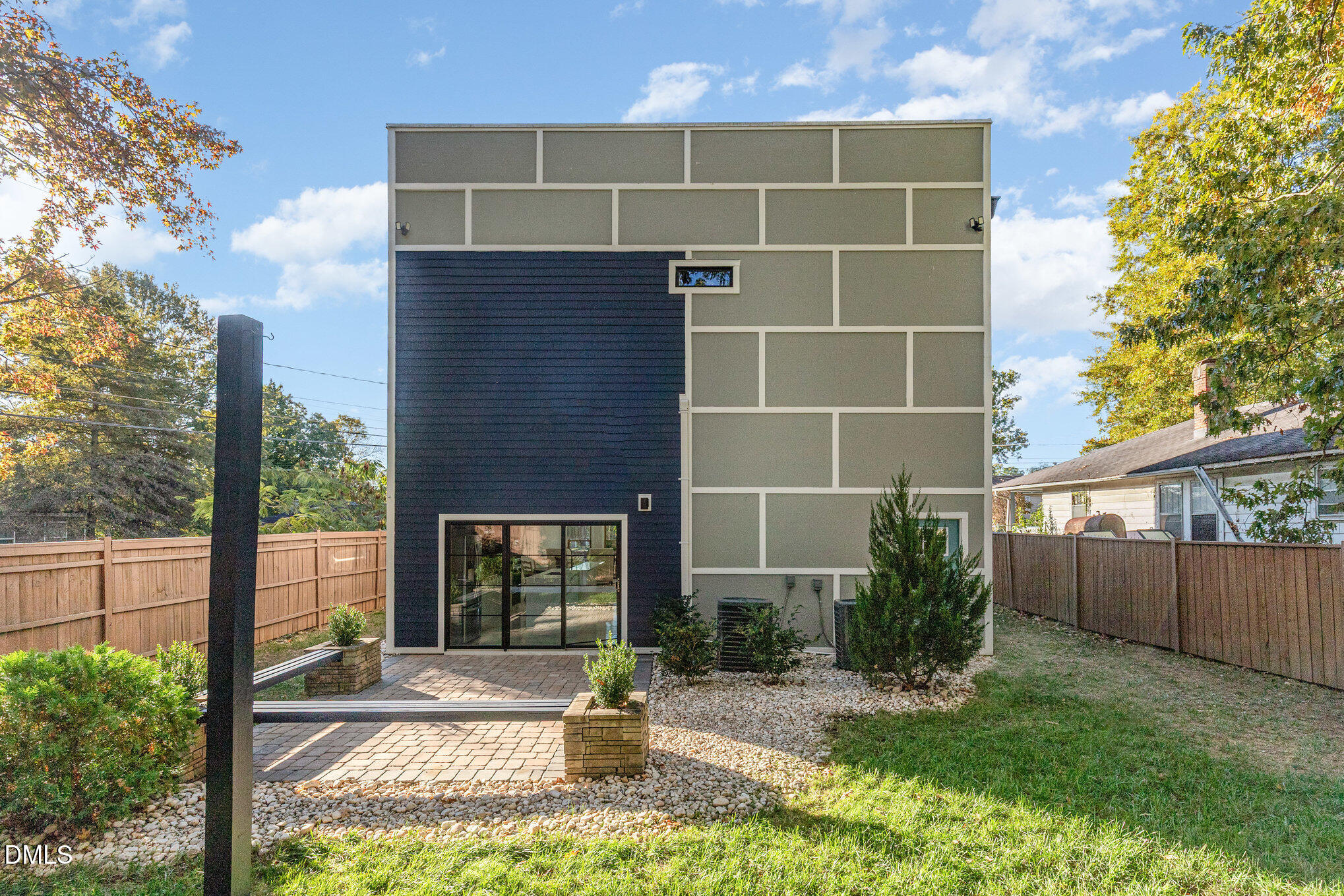 809 Drew Street Durham, NC 27701 - Photo 31 of 38 a view of house with backyard space and garden