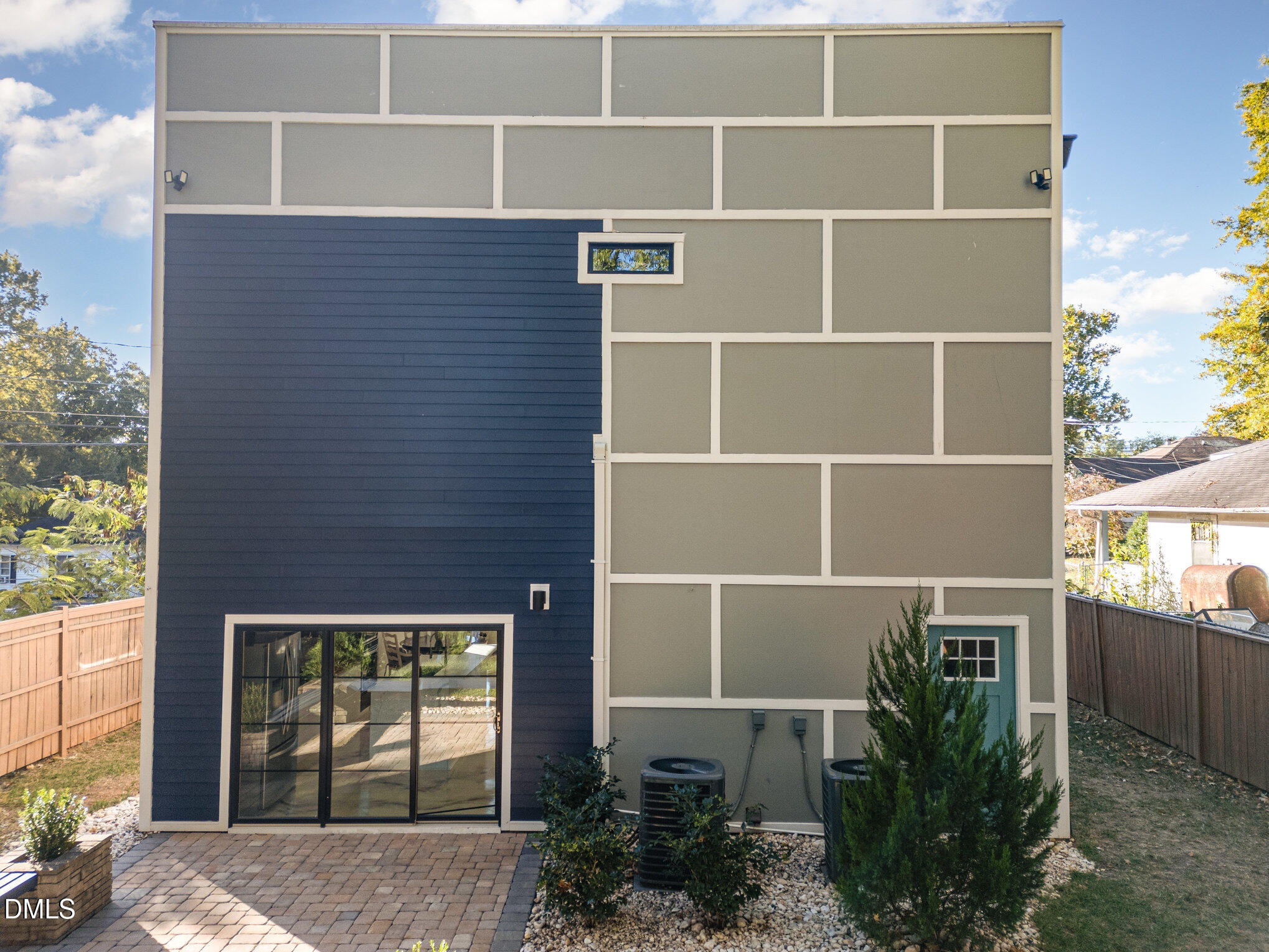 809 Drew Street Durham, NC 27701 - Photo 32 of 38 a view of a house with a potted plant and a window