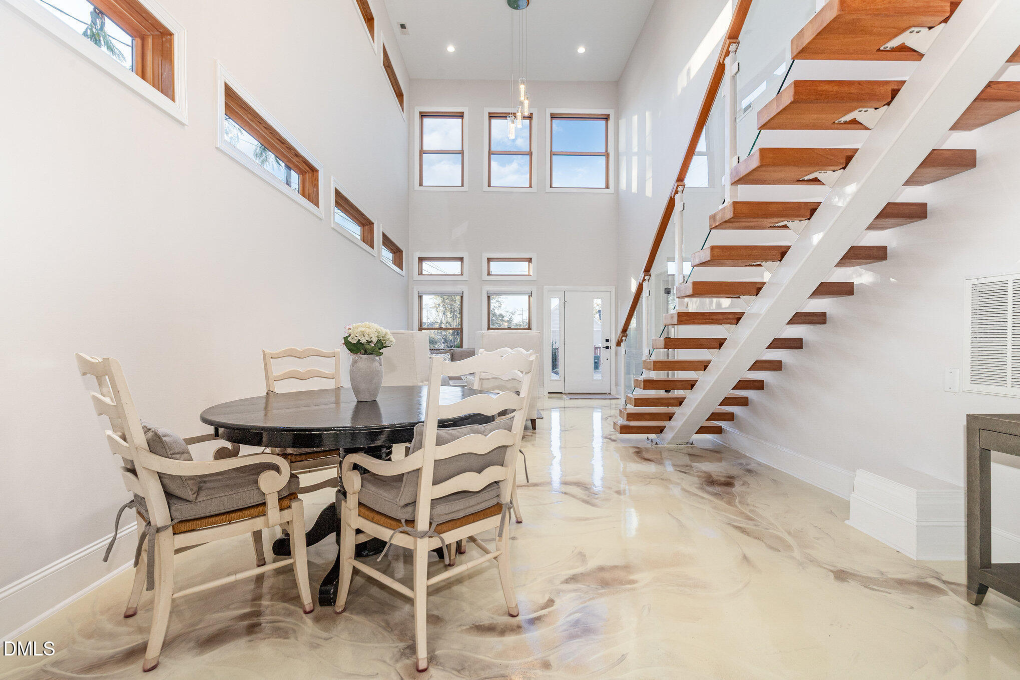 809 Drew Street Durham, NC 27701 - Photo 8 of 38 a dining room with furniture and entryway