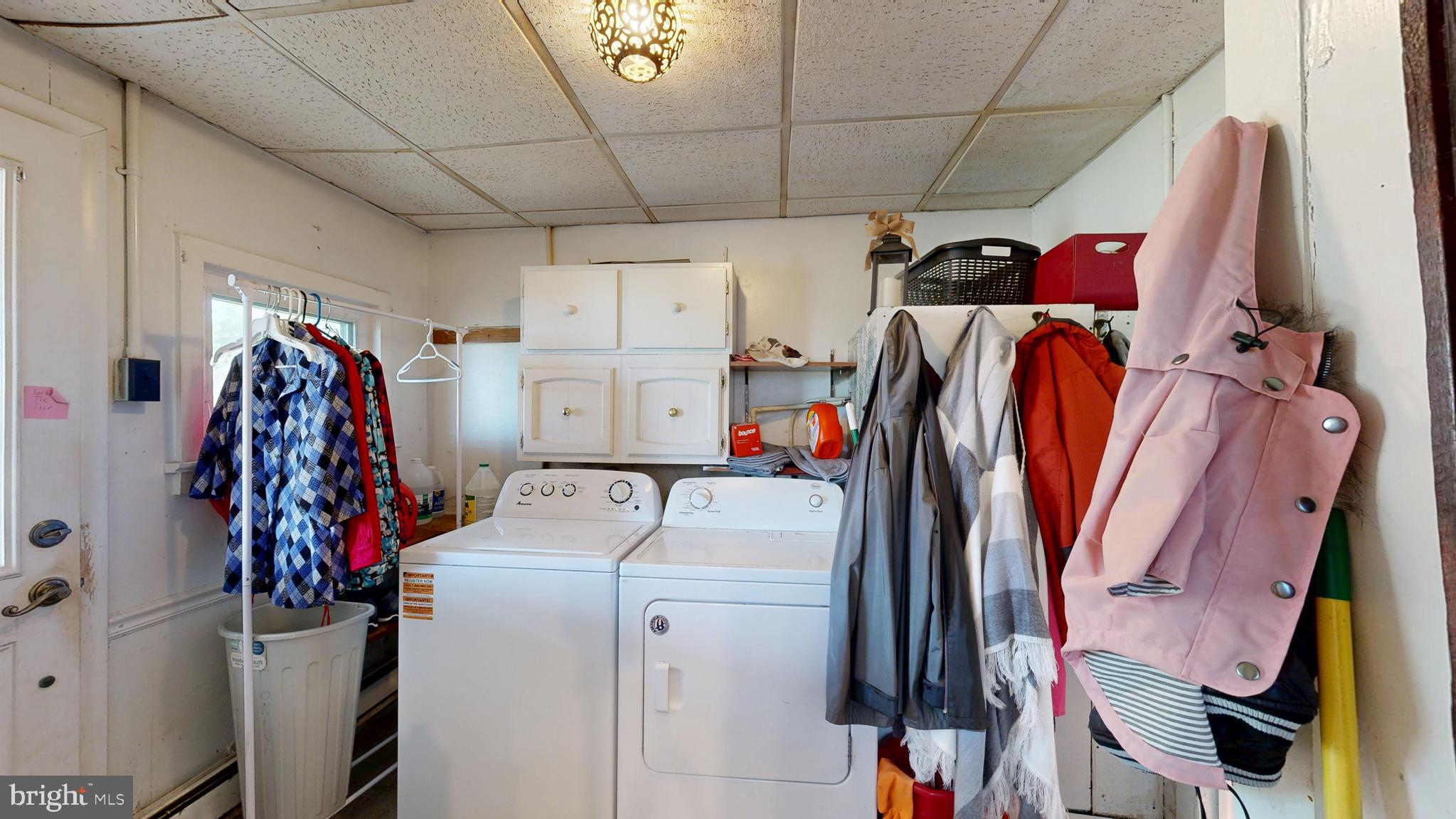 5403 Willow Grove Road Camden Wyoming, DE 19934 - Photo 13 of 44 a view of walk in closet with clothes and shoes