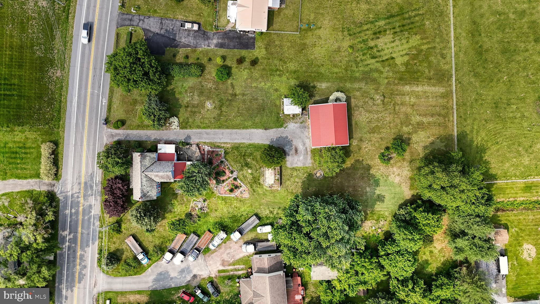 5403 Willow Grove Road Camden Wyoming, DE 19934 - Photo 28 of 44 an aerial view of residential house with outdoor space and trees