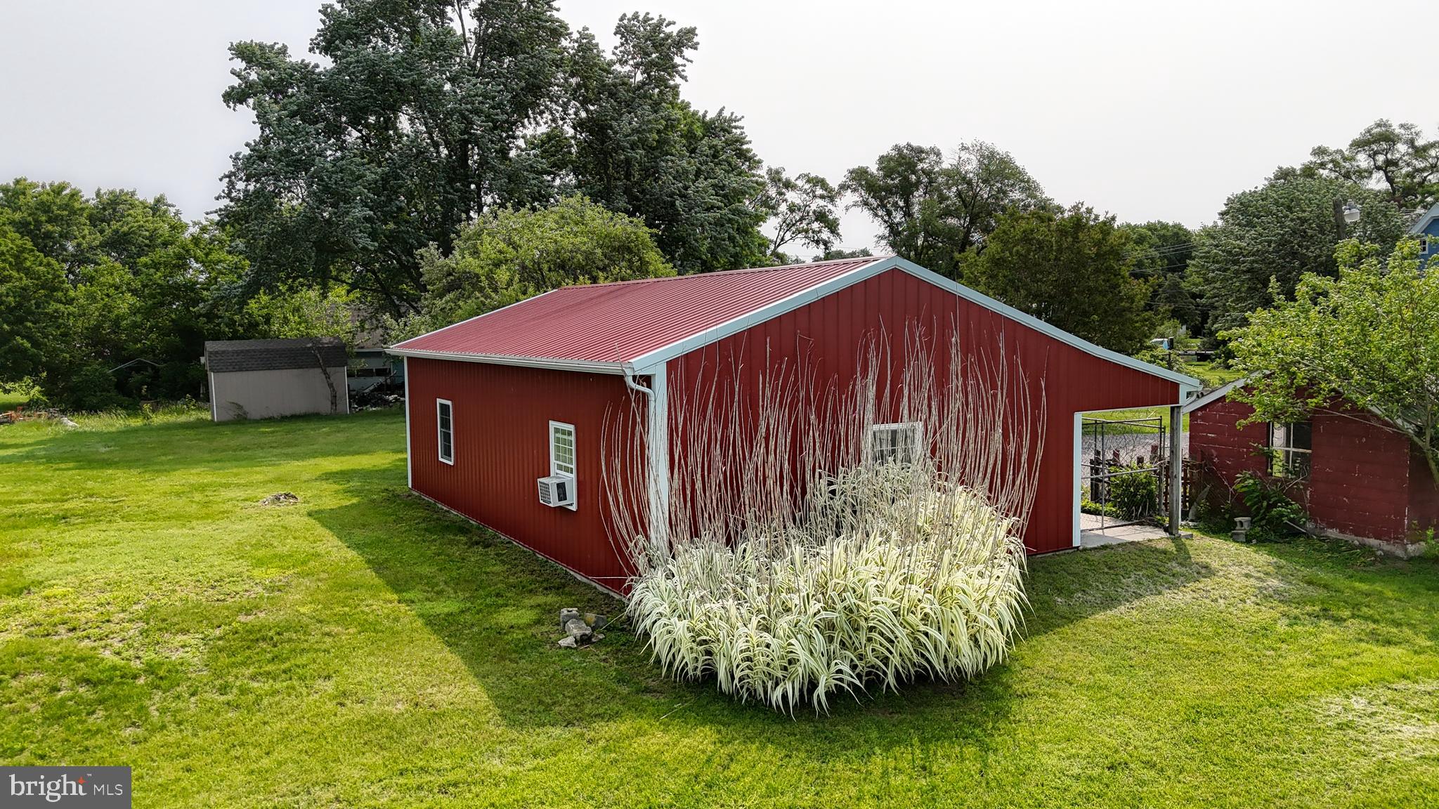 5403 Willow Grove Road Camden Wyoming, DE 19934 - Photo 31 of 44 a view of a backyard with green space