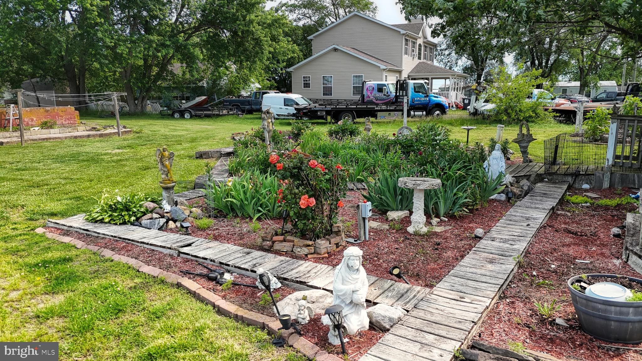 5403 Willow Grove Road Camden Wyoming, DE 19934 - Photo 35 of 44 a front view of a house with garden