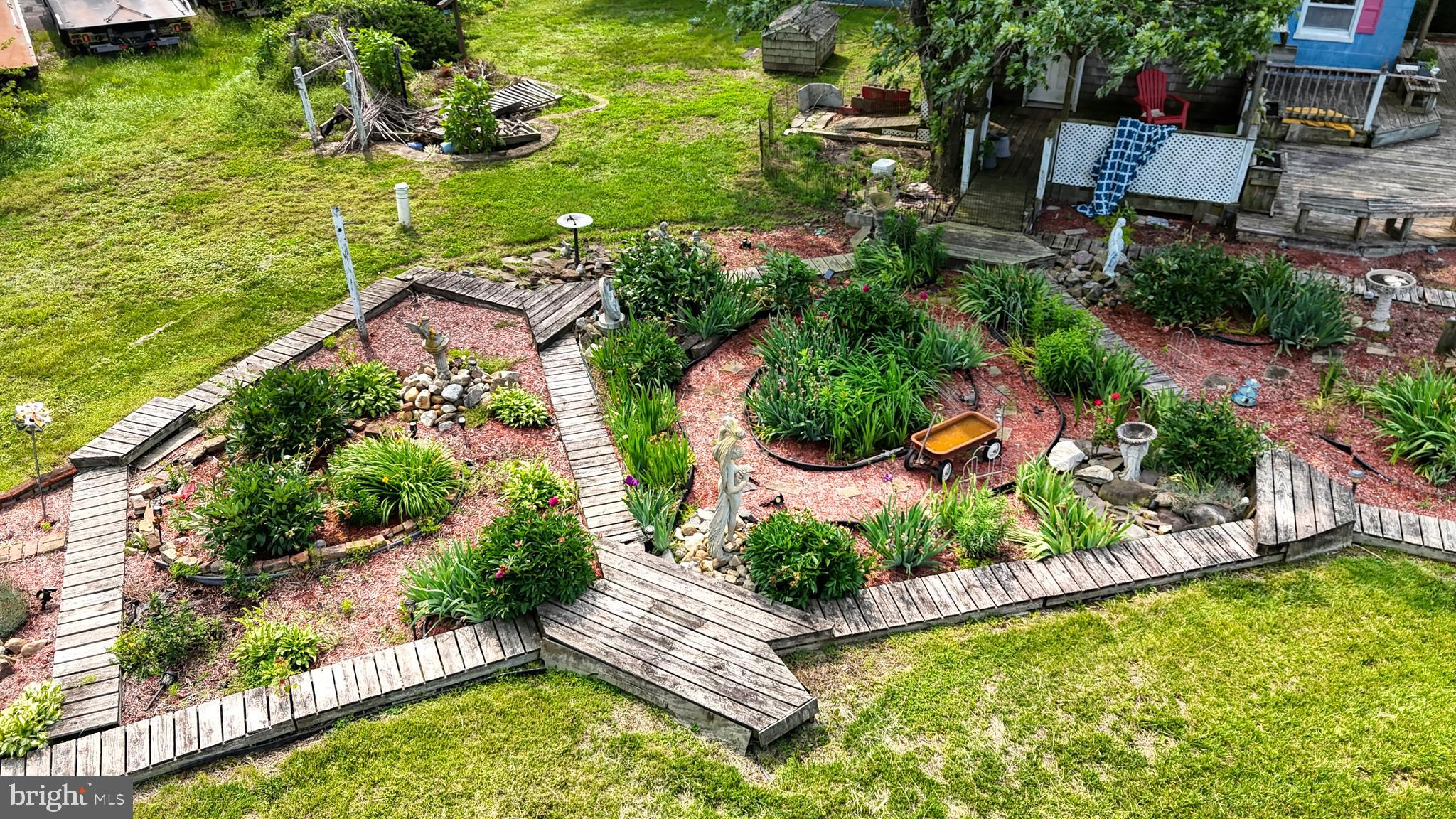 5403 Willow Grove Road Camden Wyoming, DE 19934 - Photo 37 of 44 a view of a swimming pool with lawn chairs and a yard