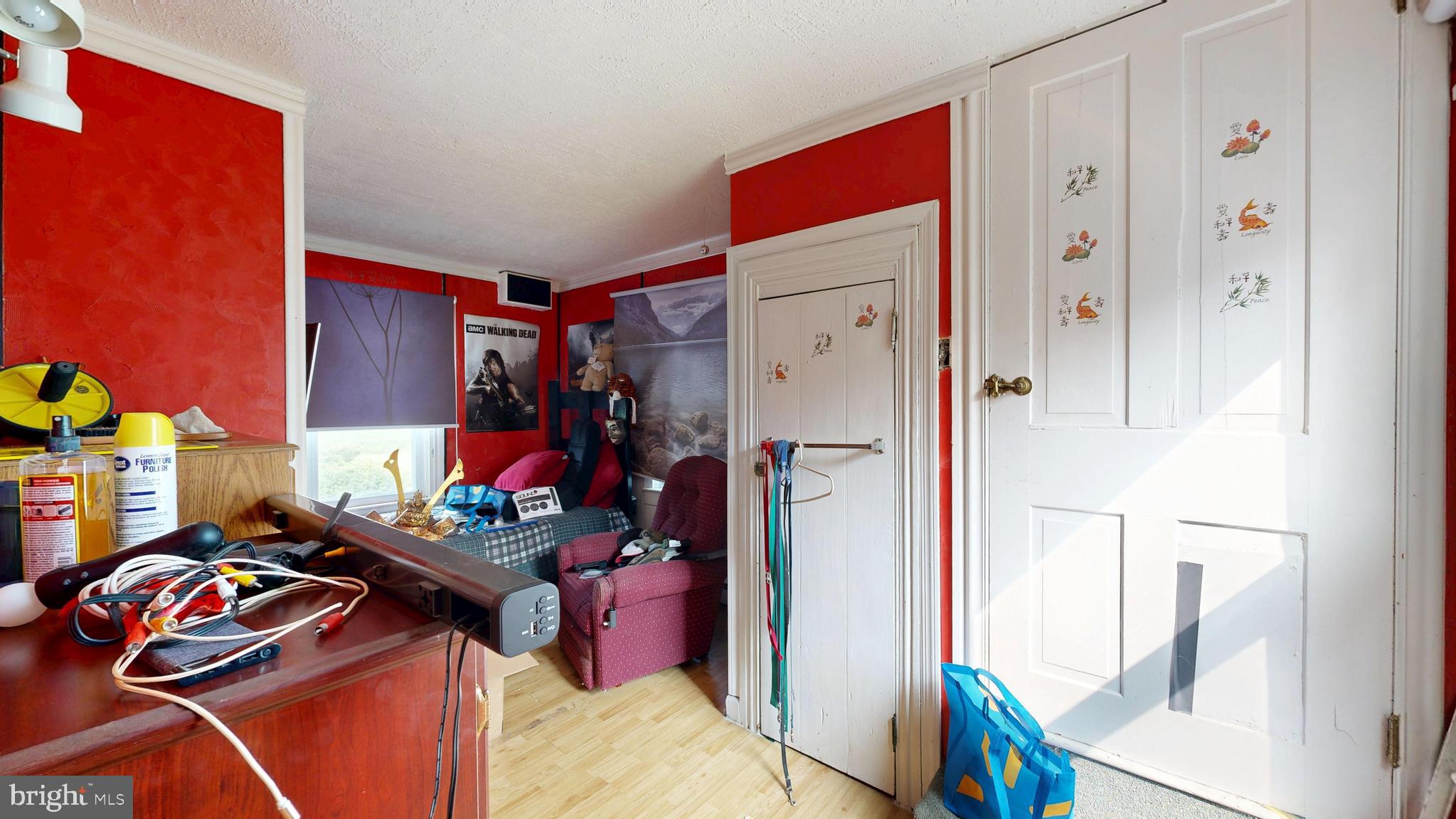 5403 Willow Grove Road Camden Wyoming, DE 19934 - Photo 4 of 44 a living room with furniture a rug and a closet
