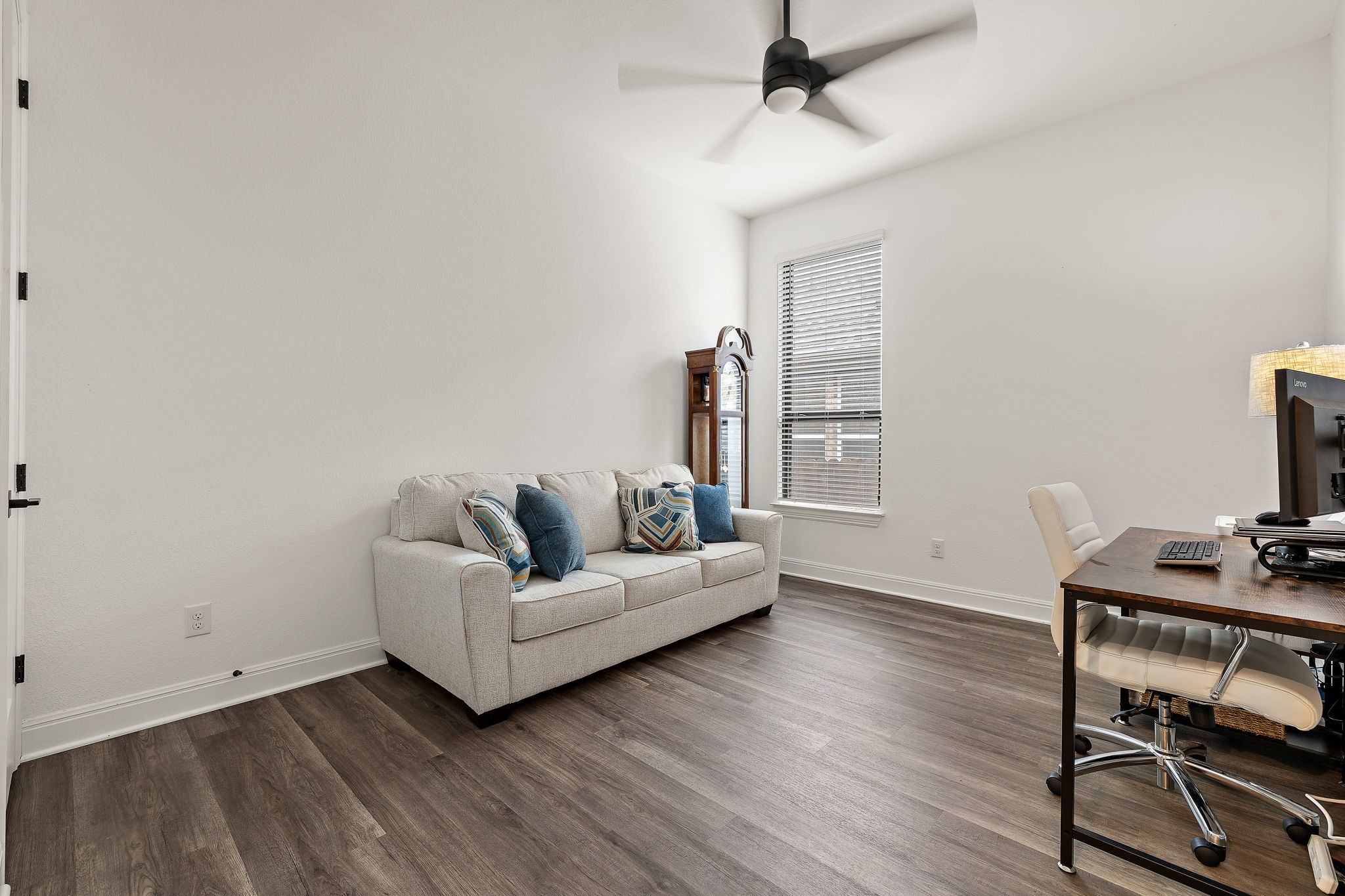 181 Constitution Way Kyle, TX 78640 - Photo 27 of 32 a living room with furniture and a window