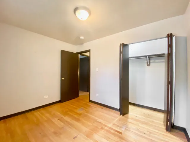 a living room with furniture a rug and a window