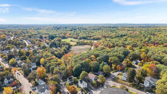an aerial view of a city with lots of residential buildings