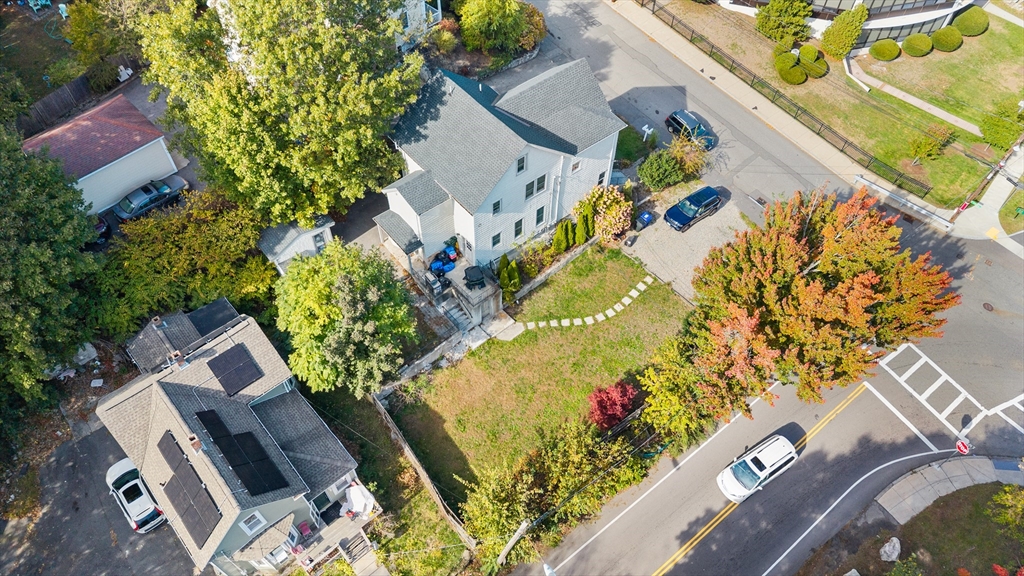 88 Gordon Avenue, Unit 2 Boston, MA 02136 - Photo 27 of 27 an aerial view of a house with a yard and garden