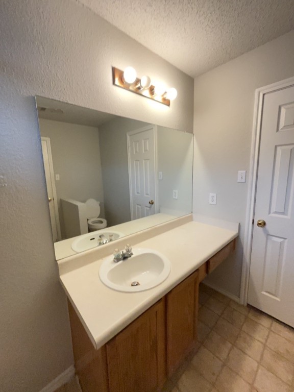 3413 Walleye Way Round Rock, TX 78665 - Photo 11 of 21 a bathroom with a sink and a mirror