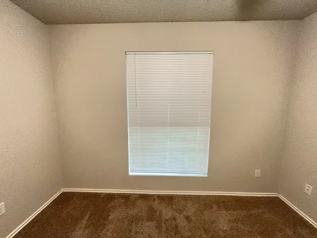 a view of a small space with a window