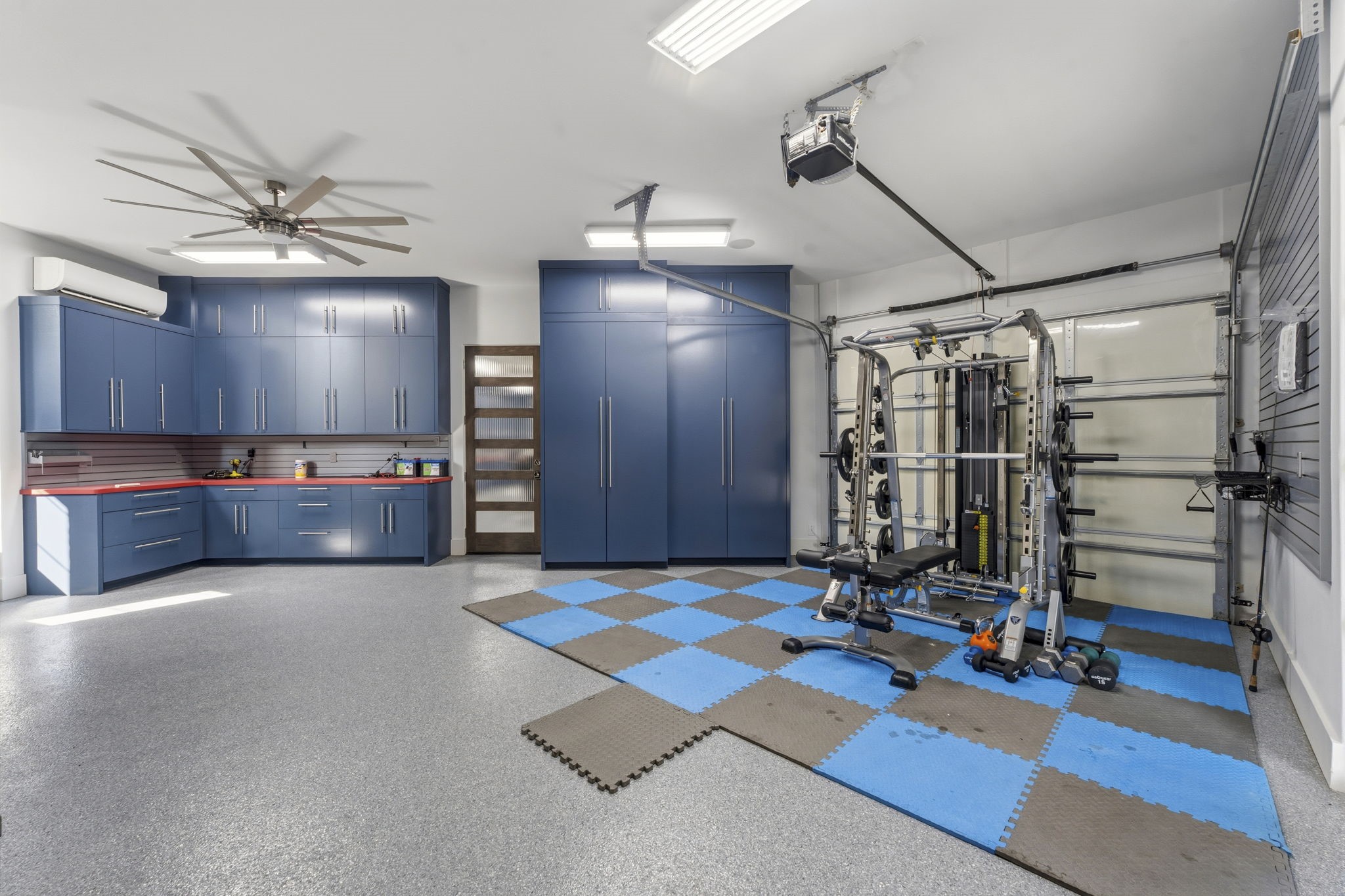 27006 Star Gazer Way Spring, TX 77386 - Photo 45 of 50 Designed for the ultimate collector or enthusiast, this expansive garage offers multiple bays, oversized RV access, and flexible space for vehicles, storage, and recreational equipment.