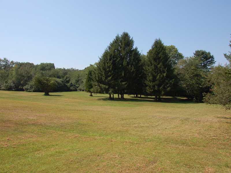148 Dunns Corner Road Westerly, RI 02891 - Photo 7 of 18 View. 148 Dunns Corner Road Westerly RI View of meadow, Perfect for farming or horses